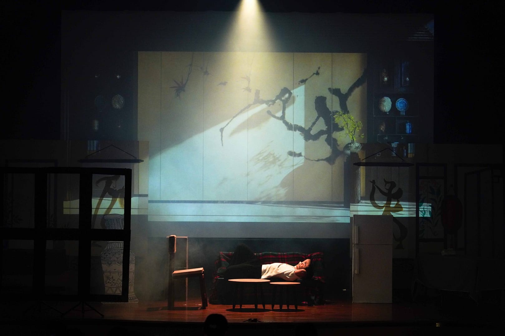 A man lying on a chair